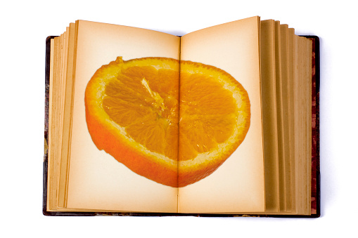 Open Book with a Slice of Orange
