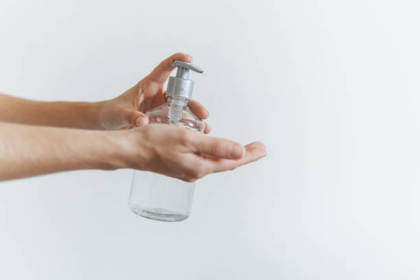 istock Hands holding a hand sanitizer bottle 1215356451