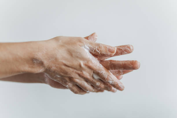istock Washing hands against a white background. 1215356479