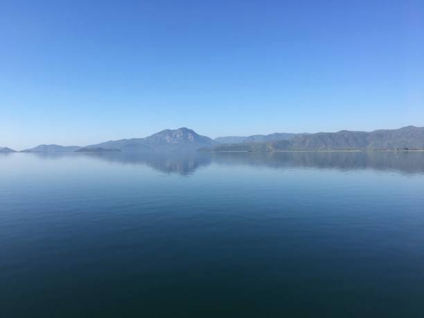 istock Lake and mountain beautiful sky 1215356691