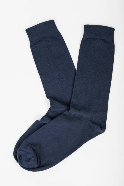 dark blue long socks for men on a neutral background