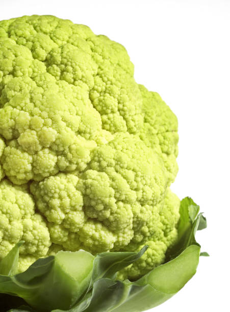 istock GREEN CAULIFLOWER AGAINST WHITE BACKGROUND 1215358977
