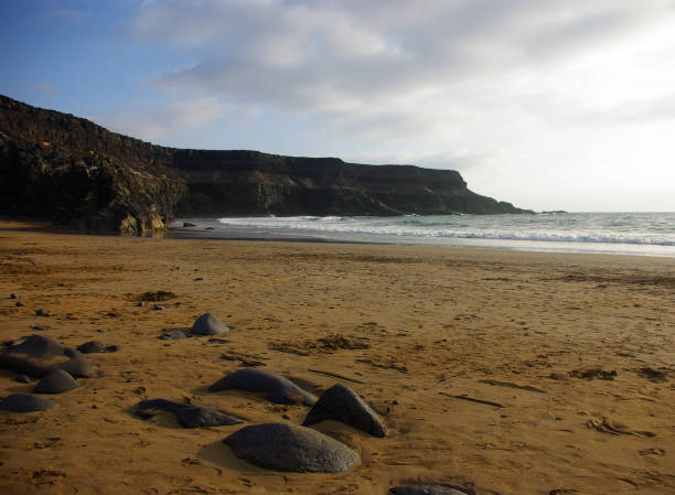 istock tranquility and calm on a deserted beach 1215359008