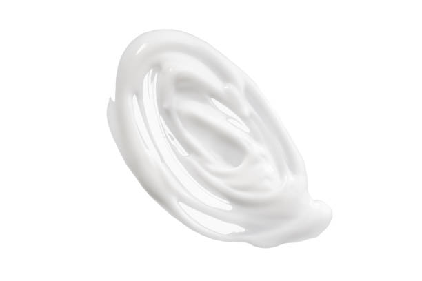 istock Cosmetic body lotion smear. White AA DD cream smudge isolated on white. 1215364762