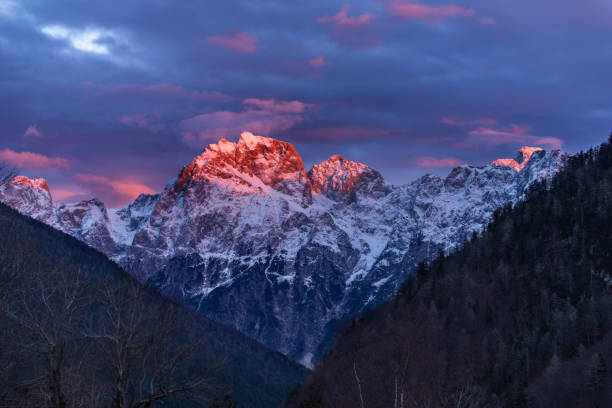 istock Sundown reflection on snowy Slovenian mountain peaks 1215372293