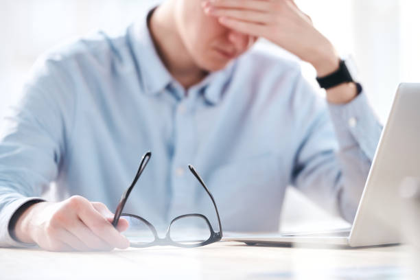 istock Migraine from exhaustion 1215372410