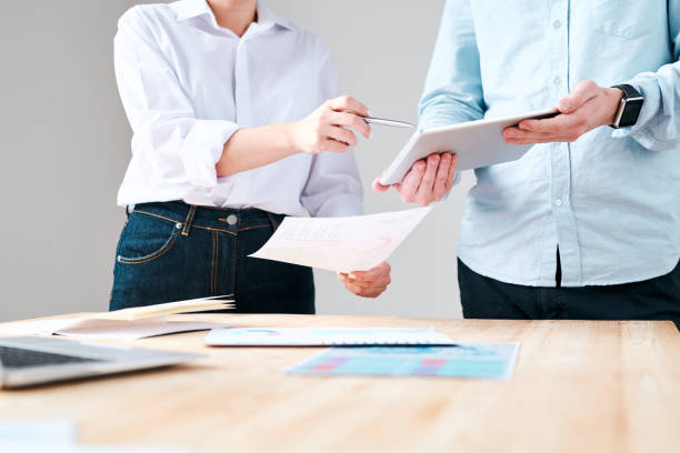 istock Discussing marketing plan with colleague 1215372543