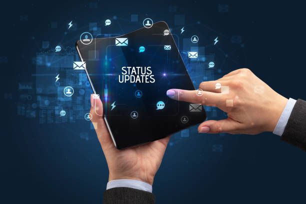 istock Businessman holding a foldable smartphone, social media concept 1215375579
