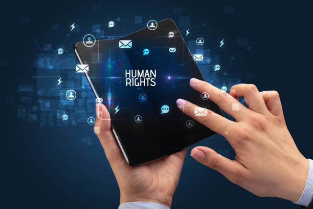 istock Businessman holding a foldable smartphone, social media concept 1215375685