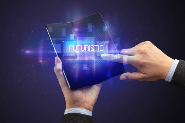 istock Businessman holding a foldable smartphone 1215376271