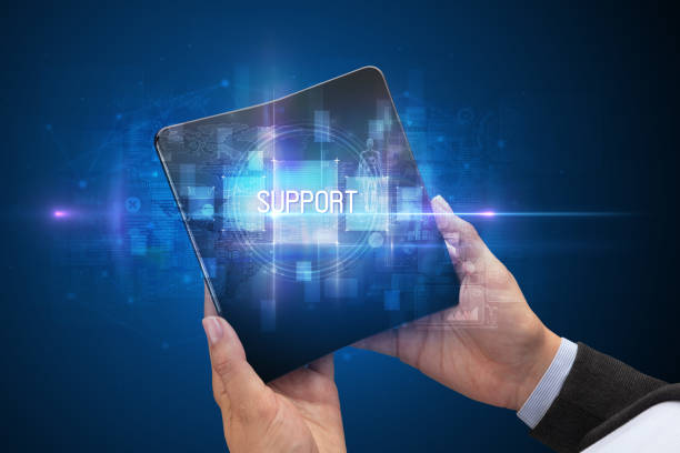 istock Businessman holding a foldable smartphone 1215376334