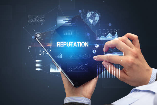 istock Businessman holding a foldable smartphone, business concept 1215376833
