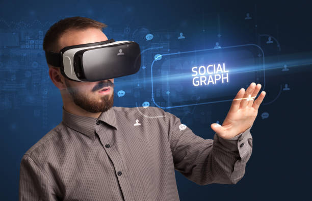 istock Businessman looking through Virtual Reality glasses, social media concept 1215377064