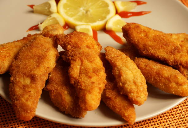 istock Crunchy fried chicken breast pieces on the plate 1215379422