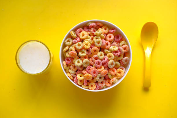 istock colorful ring corn flakes in a bowl on yellow background 1215379641