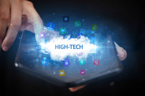 istock Businessman holding a foldable smartphone, technology concept 1215379996