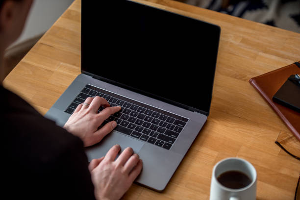 istock Young woman working from home 1215380693