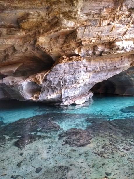 Crystal blue water at cave - Pratinha - Chapada Diamantina, Bahia, Brazil stock photo