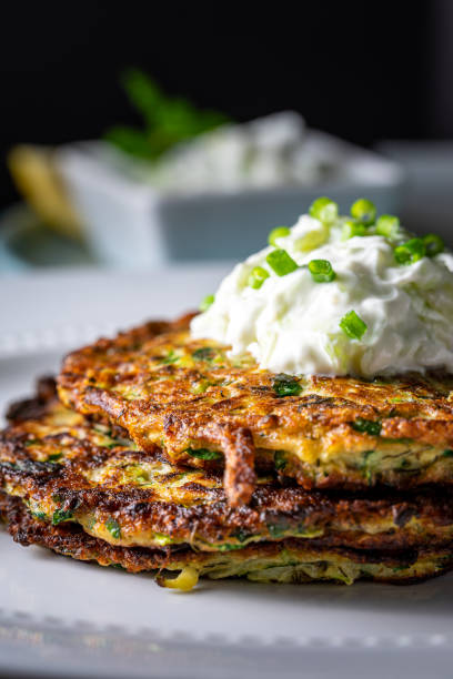 istock Pan fried zucchini fritters. 1215381240