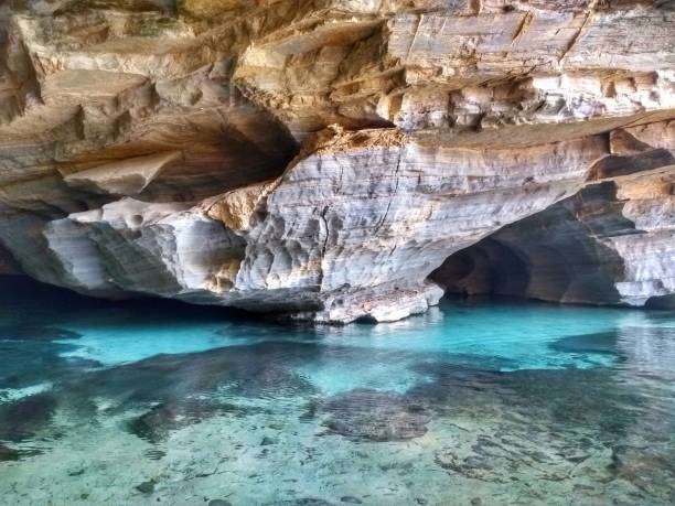 Crystal blue water at cave - Pratinha - Chapada Diamantina, Bahia, Brazil stock photo