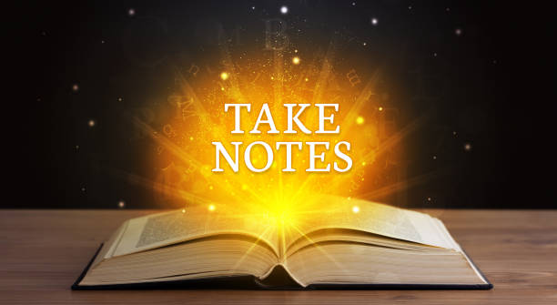 istock Educational inscription coming out from an open book 1215382743
