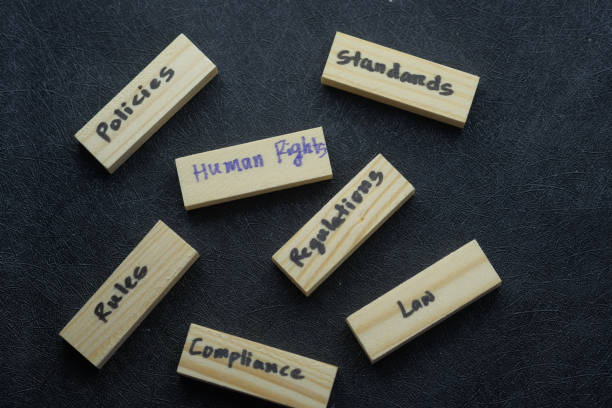 istock human right on wooden block on black table 1215383826