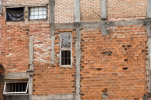 brick facade of residence in slum on sao paulo, brazil