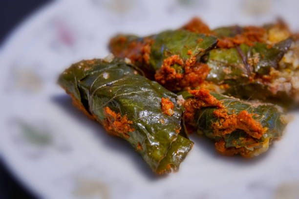 istock Stuffed cabbage rolls with rice and meat in tomato sauce 1215385128