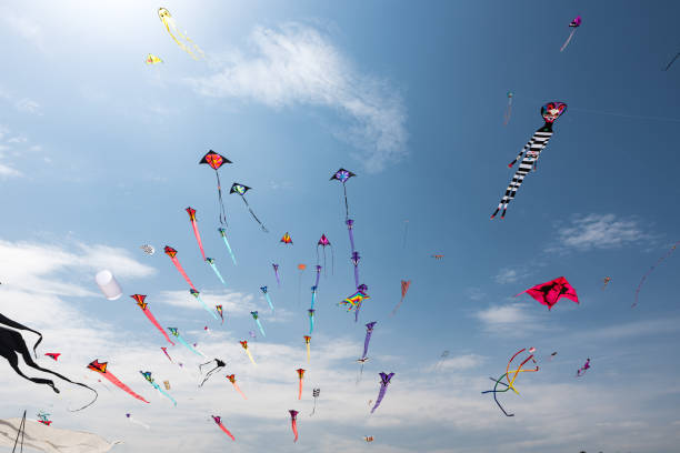 istock Kites with blue sky and white clouds 1215386185