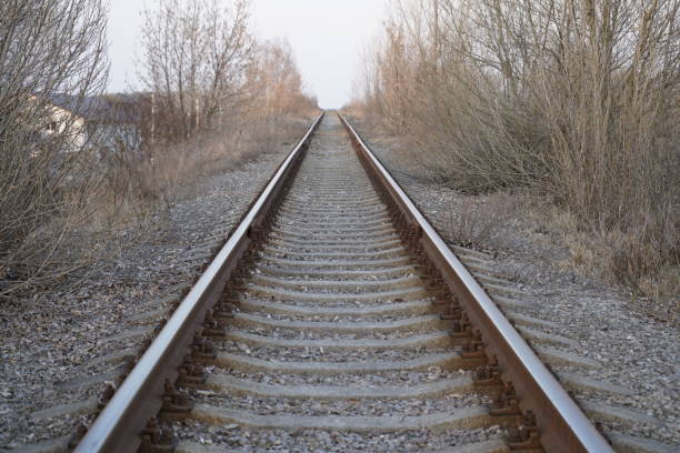 istock Railroad track, rails and railway sleepers. 1215390367
