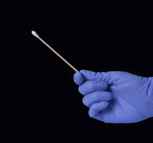 laboratory test cotton swab wipe Virus DNA cotton swab wipe saliva test medic hand cotton swab photos stock pictures, royalty-free photos & images