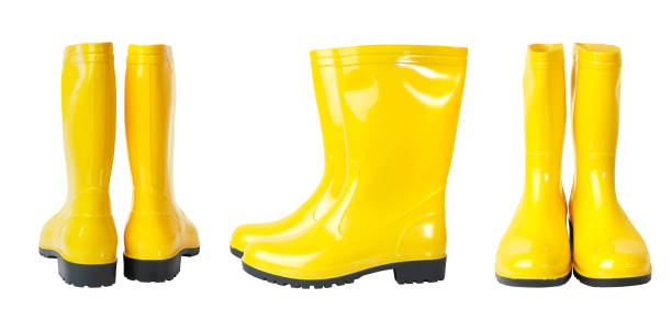 istock Set of yellow rain boots isolated on white background 1215397502