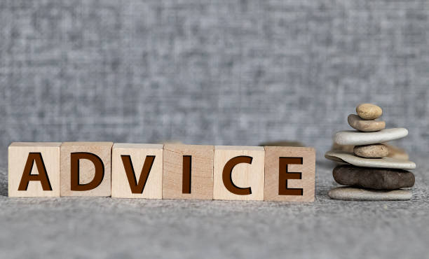 istock word advice on wooden blocks that stand on shelves 1215403079