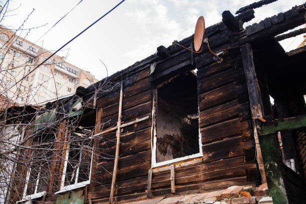 istock Burnt old rural house. Consequences of fire 1215404711