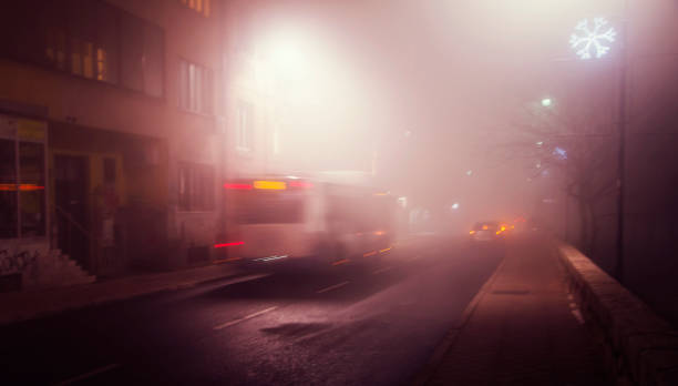 istock Traffic on a foggy winter night 1215406778