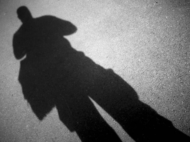 istock Shadow of a photographer 1215406989