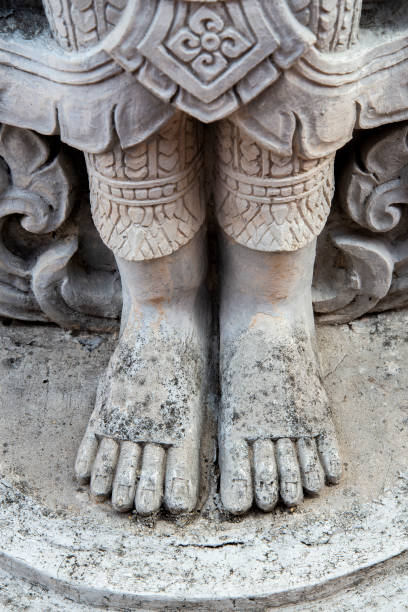 istock Deva carving statue ,The foot of graven image 1215409137