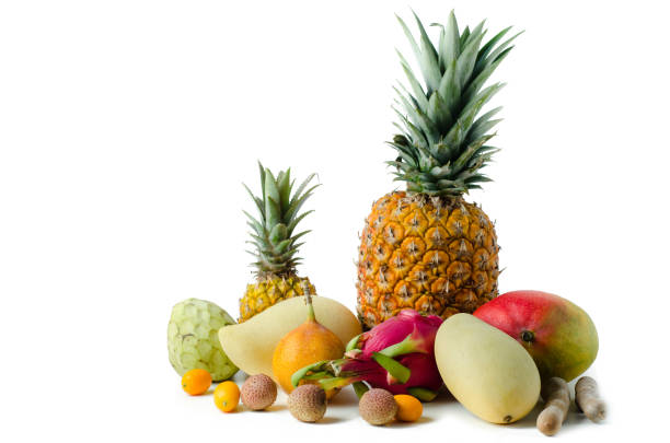 istock Different tropical fruits isolated on white background 1215415698