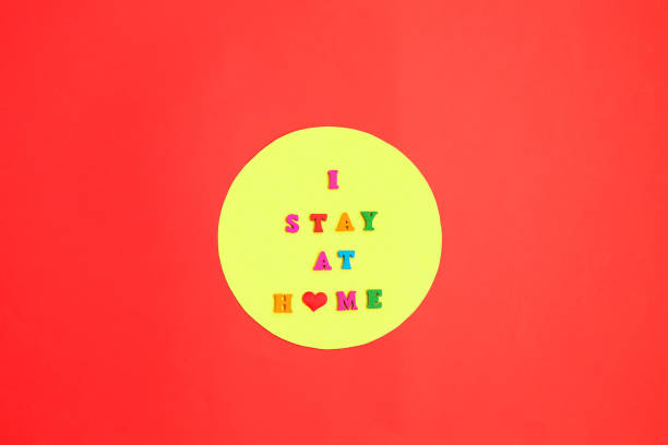 I Stay at Home phrase on red background.