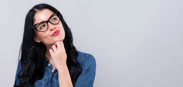istock Young woman in a thoughtful pose 1215416728