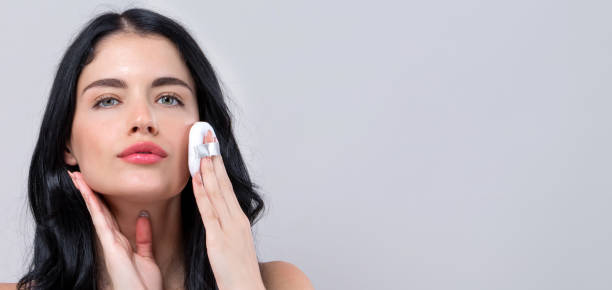 istock Beautiful young woman with makeup kit 1215416741