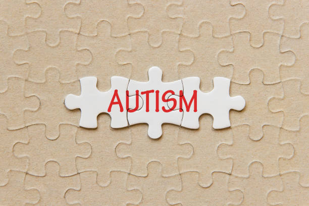 istock Puzzle pieces with word 'Autism’ 1215418391