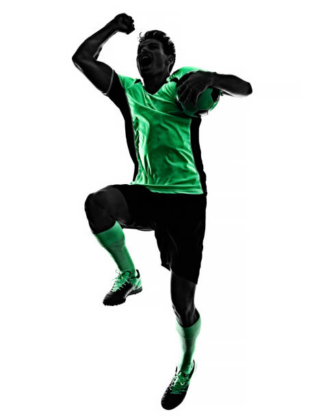 istock young soccer player man silhouette shadow isolated white background 1215423056