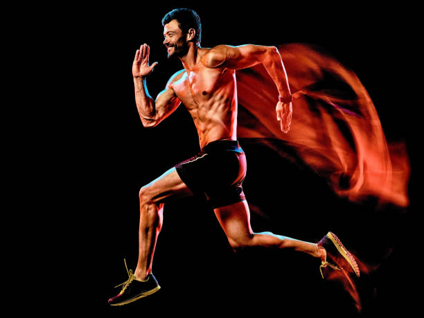 istock topless muscular man runner. running jogger jogging isolated black background 1215423124