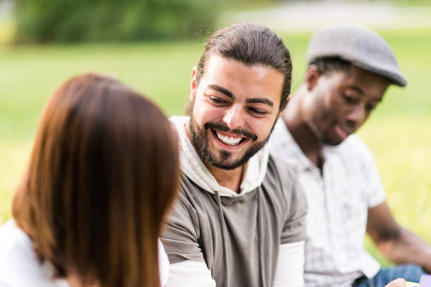 istock Group of University Students Sit Outside stock photo 1215428802