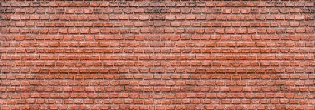istock Dark brown old bricks wall panorama. Abstract brick texture for design or wallpaper. 1215430293