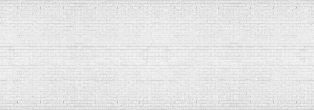 istock Abstract white brick wall texture for your design background or wallpaper. Panorama picture. 1215430334
