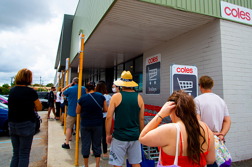 People queuing at Coles grocery store during the Coronavirus crisis