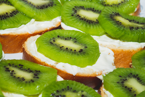 Sandwiches with kiwi. bread with fruit slices. background with appetizer