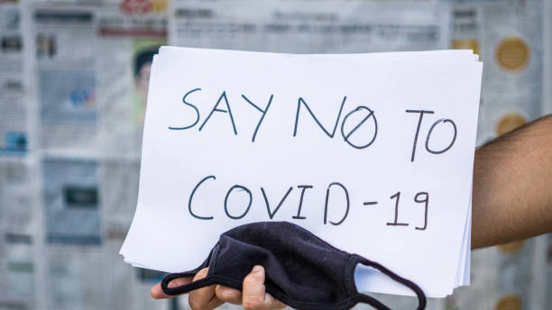 istock mask and board of stop corona 1215444087